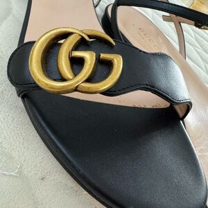 Authentic Gucci Women's Black Sandals with Gold Logo Accent